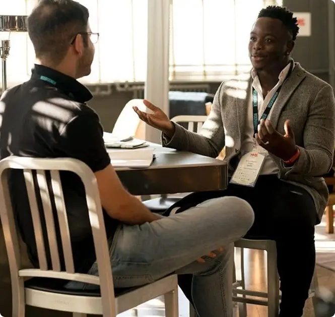 Two men having a thoughtful coaching conversation