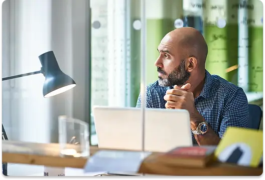 Man reflecting while working toward personal clarity
